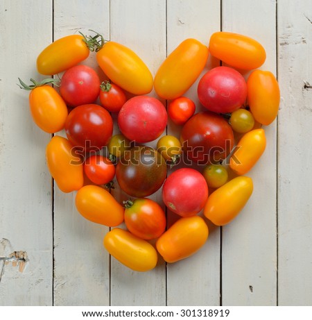 Composition in the form of heart from cherry tomatoes