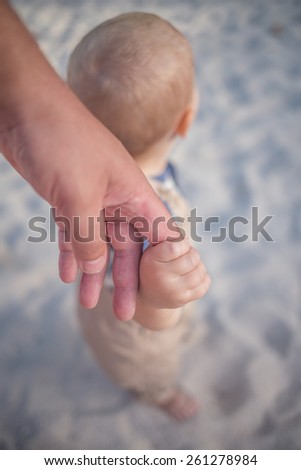 Father and son Holding hands