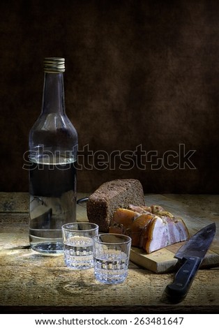 Vodka with black bread and bacon
