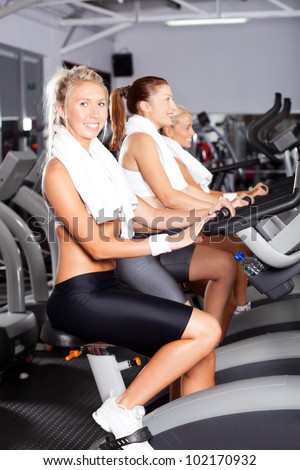 group of girls on gym bike