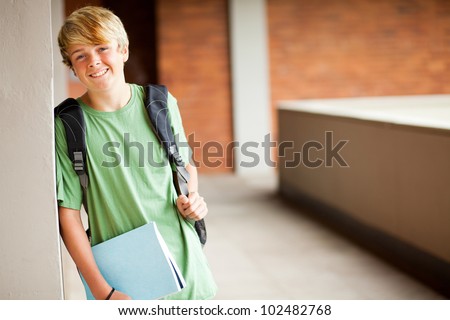 cute high school boy portrait in school