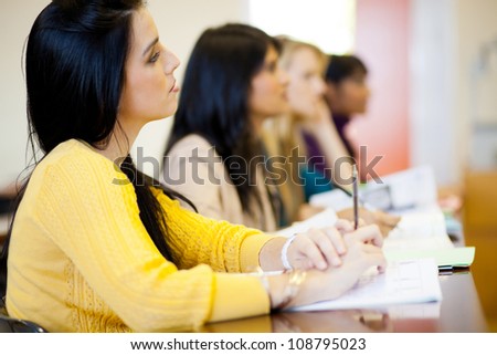 group of young college students in classroom
