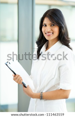 attractive modern young indian office worker
