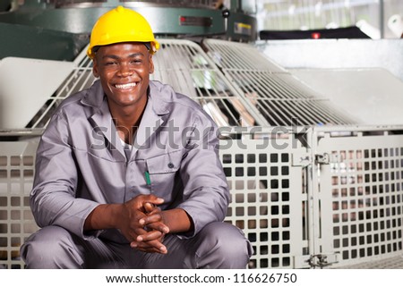 happy african american textile factory worker portrait