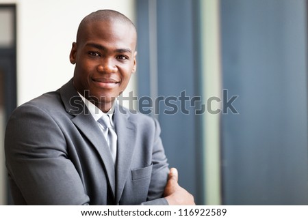 peaceful african american businessman in office