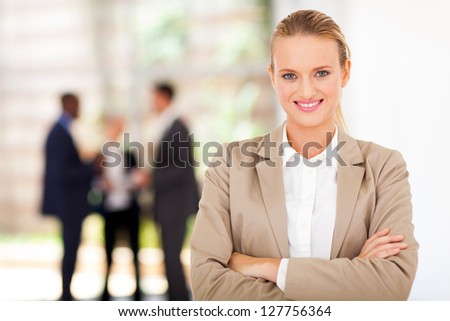 beautiful blond businesswoman portrait in office