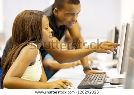 group of african american college students in computer room