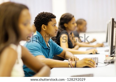 group of african university students in computer room