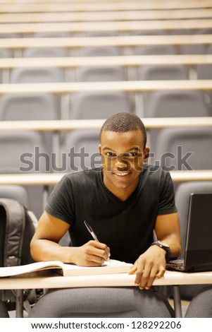 male african american college student in lecture hall