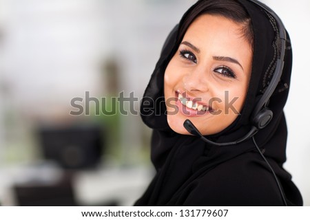 pretty Arabian call center operator closeup portrait