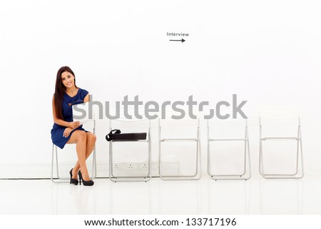 beautiful young business woman preparing for job interview