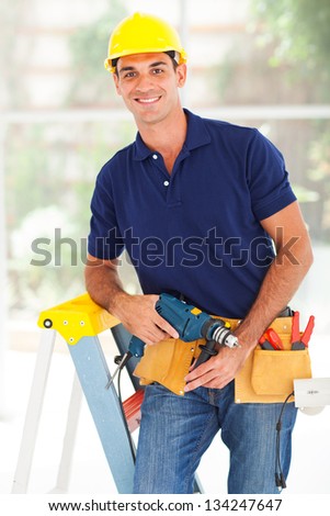 happy cctv system installer with tools