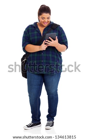 full length of plus size college student with tablet computer over white background