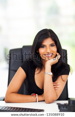 beautiful smart indian career woman in office