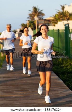 fit modern family jogging in the morning