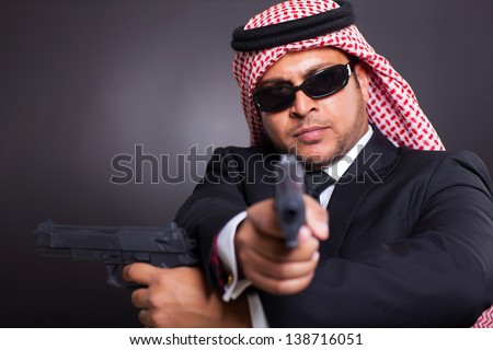 arabian spy with two handguns