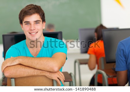 handsome male college student in computer class