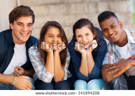 portrait of happy highschool students outdoors