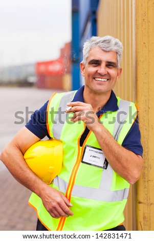 shipping company worker smoking during break