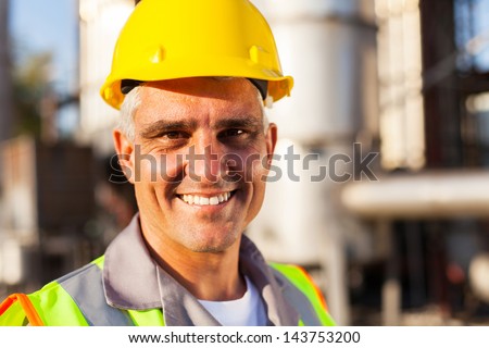 senior oil and chemical worker closeup portrait