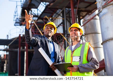 chemical industrial manager and senior worker at petrochemical plant
