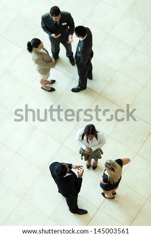 Above View Of Group Of Business People Having Informal Meeting