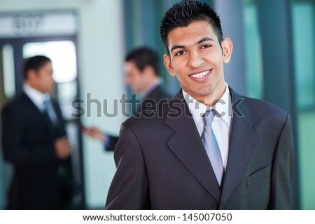 happy modern middle eastern businessman in office