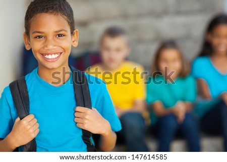 Cheerful African American Primary School Boy With Backpack