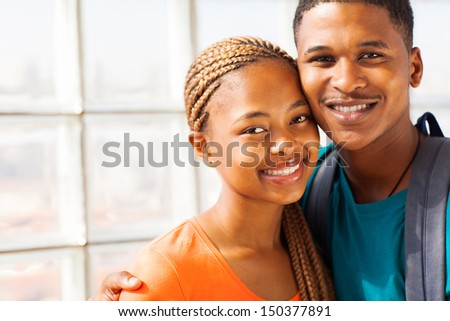 cheerful african american university couple on campus