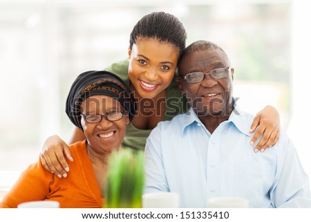 portrait of happy african family at home