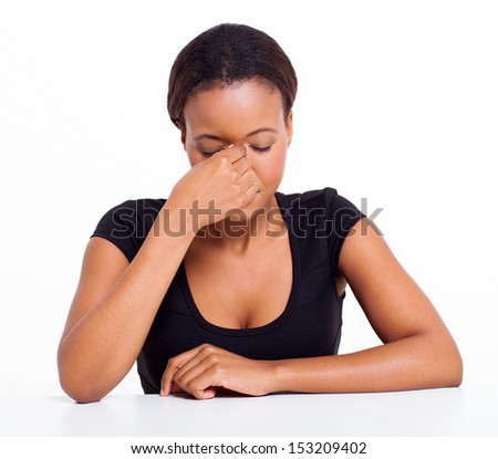 stressed african businesswoman having headache isolated on white