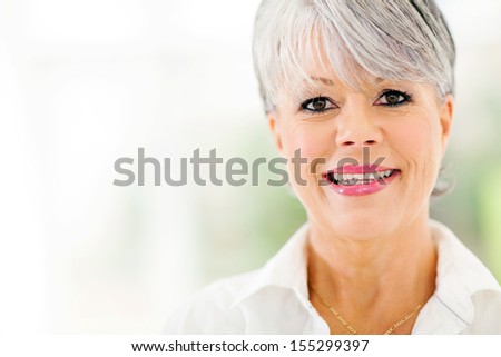 close up portrait of beautiful middle aged woman indoors