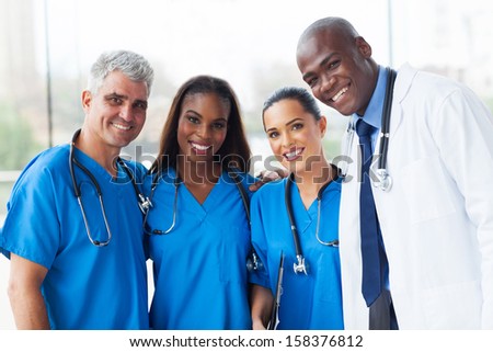 group of happy multiracial medical team in hospital