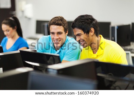 happy college students learning computer skills