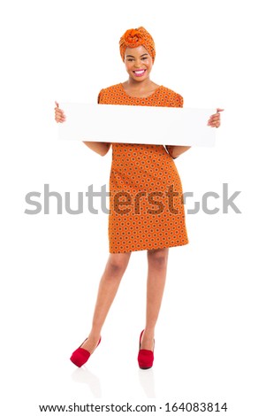 cheerful young african woman holding white board on white background