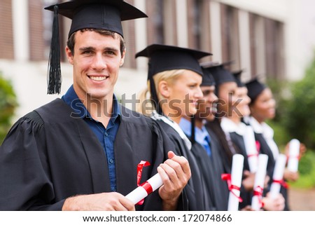 portrait of group cheerful college graduates at graduation