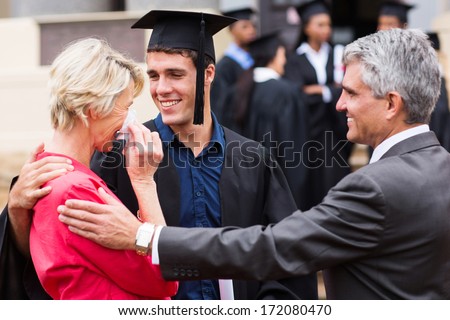proud mother with tears of joy at her son\'s graduation