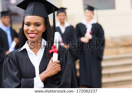portrait of happy african female graduate at graduation portrait of happy african female graduate at graduation