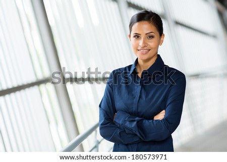 beautiful young career woman in modern office