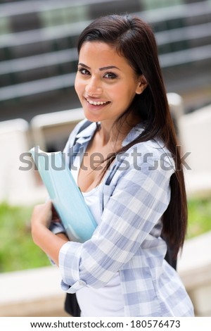 portrait of pretty college student on campus