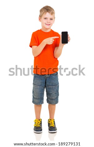 cute boy pointing at smart phone on white background