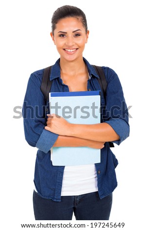 portrait of pretty female college student holding books