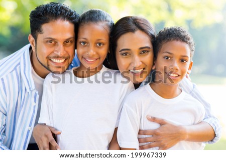 portrait of beautiful indian family outdoors