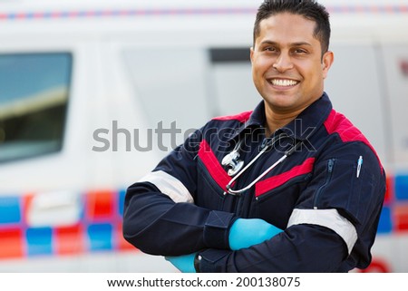 good looking male ambulance staff with arms crossed