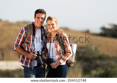 happy young couple traveling together