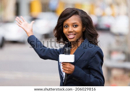 professional african news reporter in live broadcasting on street