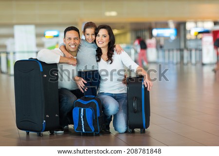 cute family portrait at airport