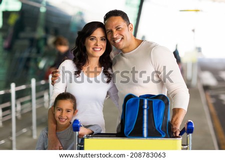portrait of beautiful family at airport