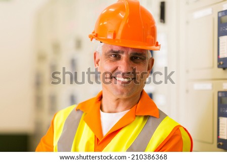 close up portrait of middle aged power company technical worker