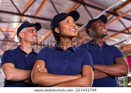 group of textile co-workers looking up
